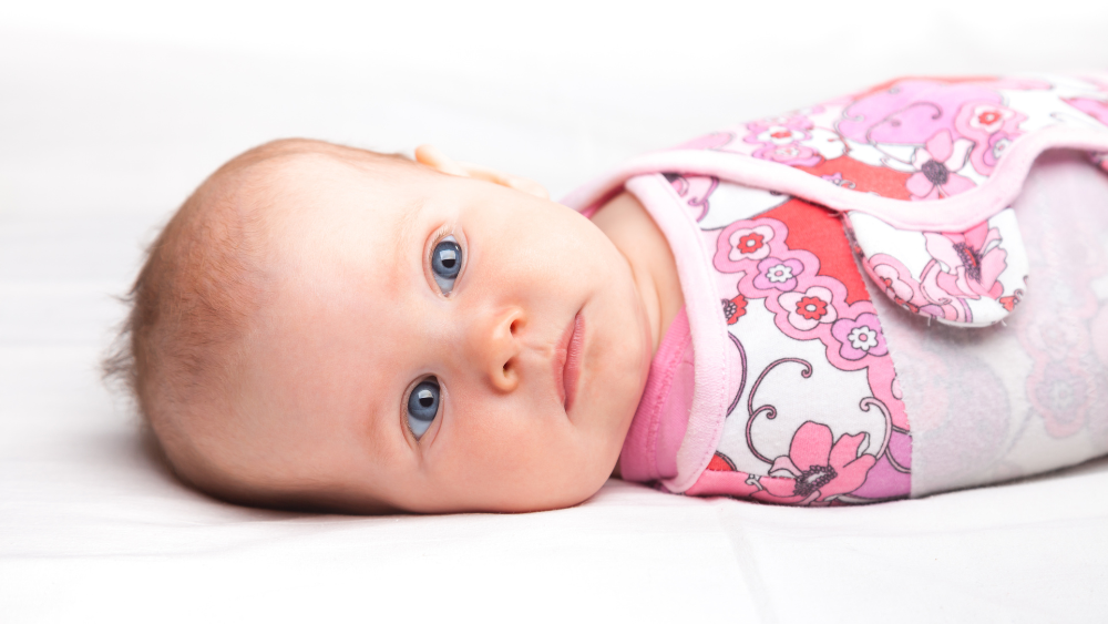 How to Help a Baby Who Hates Being Swaddled (But Sleeps Better With It)